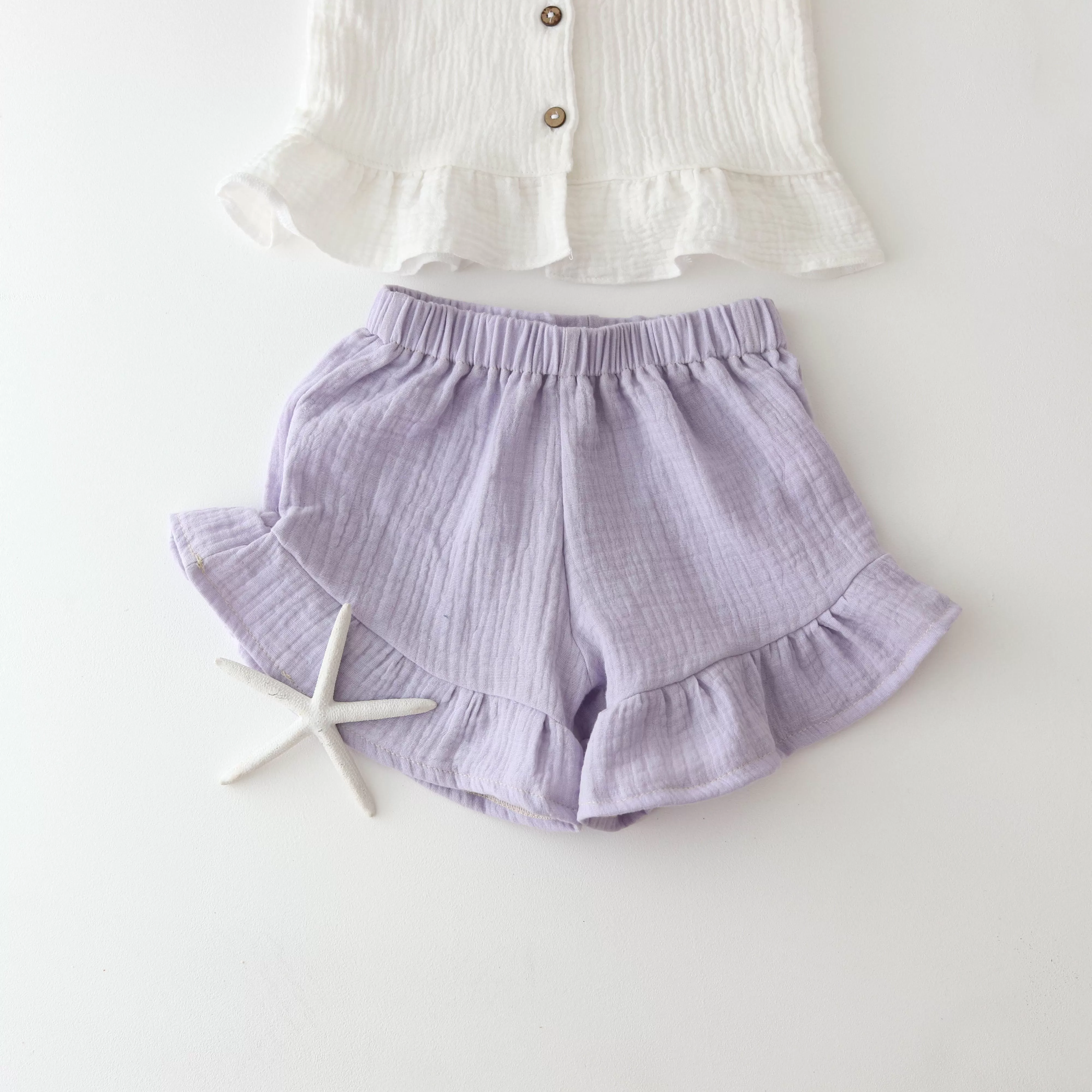 Muslin shorts with a ruffle - PASTEL LILAC